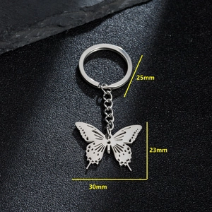 Polished stainless steel butterfly pendant keychain with detailed cutout wing patterns