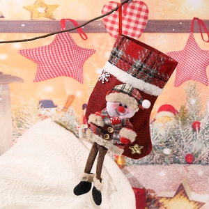 Christmas stocking with red plaid and plush snowman, festive holiday home decoration