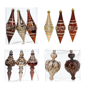 Premium champagne and coffee Christmas ornaments set with sequins and beads on white background