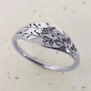 Vintage silver floral engraved wide band ring with intricate leaf patterns for women