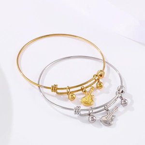 Minimalist guitar charm bracelet in gold and silver finish with adjustable steel band