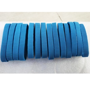 Close-up of bright blue elastic woven wristbands with high-density fiber texture