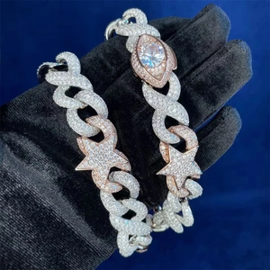 Macro view of iced-out hip hop star pendant with dual-tone cubic zirconia cuban chain