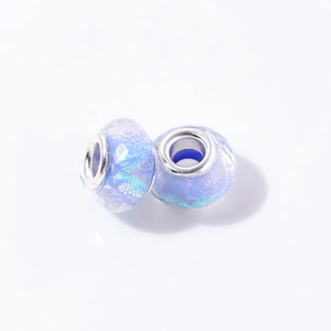 Polished resin opal faceted beads with colorful laser pattern and silver metal core