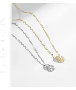 Macro shot of s925 silver interlocking knot necklaces with pave cubic zirconia accents