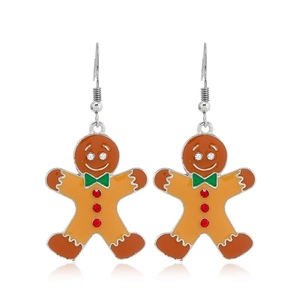 Macro detail of gingerbread man earrings with orange enamel and red rhinestone accents