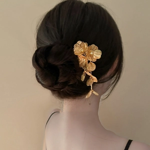 Elegant gold metal floral hair pin with hollow flowers for women hairstyling accessories