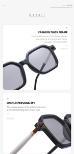 Detail of square thick frames and black and white spliced temples with metal hinges
