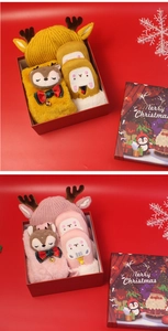 Christmas gift box with reindeer knit hats and plush gloves for kids in yellow and pink
