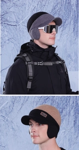 Close-up of winter knit baseball hat with earflaps for outdoor cycling and skiing