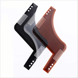 Three men's beard shaping combs in black, clear and brown colors on a white background