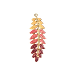 Detailed macro view of leaf pendant with yellow orange red gradient enamel and gold metal