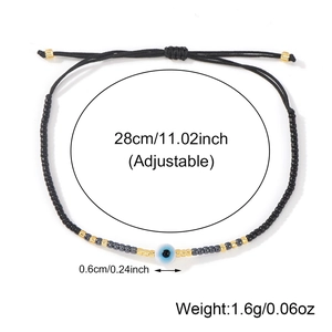 Pulsera ajustable de ojo turco con cuentas negras y cordón trenzado elegante