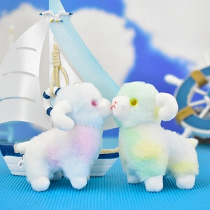 Detailed view of two cute gradient plush sheep keychains kissing in a nautical setting