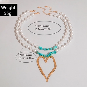 Layered faux pearl and turquoise necklace with large gold irregular heart pendant