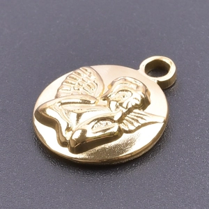 Close-up of golden stainless steel angel relief pendant with a polished metal finish