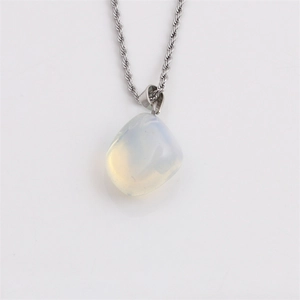 Irregular opal stone pendant on silver twisted chain necklace with lobster clasp