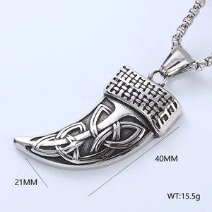 Detailed close-up of a silver Viking tooth pendant with Celtic knot patterns and dimensions