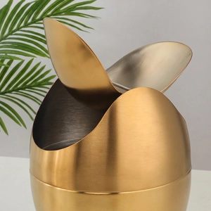 Mini egg-shaped gold stainless steel desktop trash can with swing lid for office use