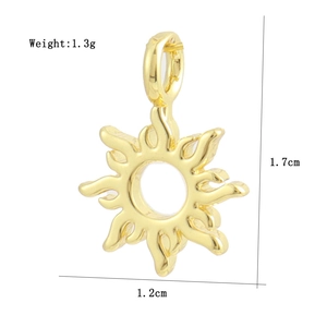 Detail view of a gold sun pendant charm with micro-pave cubic zirconia and dimensions