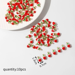 Set of 10 red enamel strawberry charms for DIY jewelry making measuring 1.3cm by 0.7cm