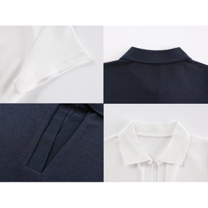 Detailed close-up of the polo shirt collar, sleeve cuff, and breathable knit texture