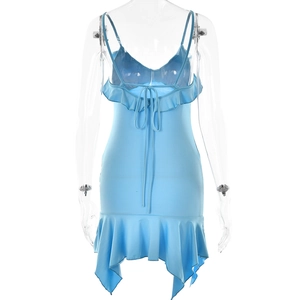Detail view of the blue V-neck dress featuring ruffle hem and lace-up back design