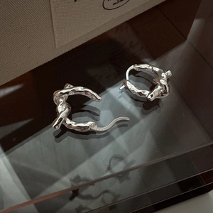 Minimalist S925 sterling silver knot earrings with unique textured lava design for women