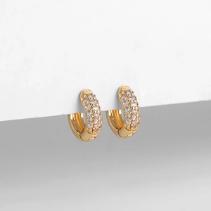 Detailed close-up of 18K gold-plated hoop earrings with triple-row micro-pave cubic zirconia