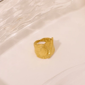 Minimalist wide band open ring in gold finish with a vintage hammered metal texture