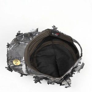 Close-up of 3D camouflage hat with breathable mesh lining and tactical leaf design