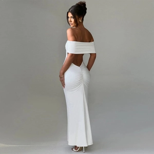 Detailed back view of white tube dress featuring elegant ruching and slim fit design