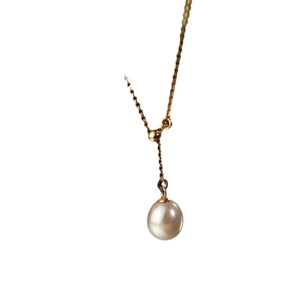 Elegant Y-shaped gold necklace with a radiant white rice pearl pendant for women