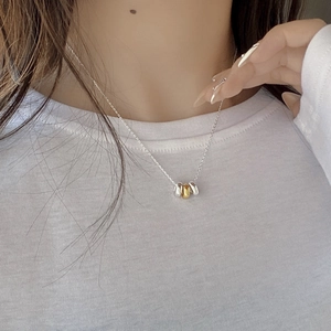 Minimalist S925 sterling silver three-ring necklace with tricolor pendants on model