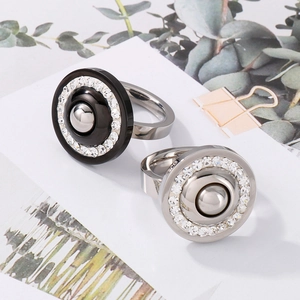 Fashionable stainless steel rings in black and silver finishes featuring zircon inlays