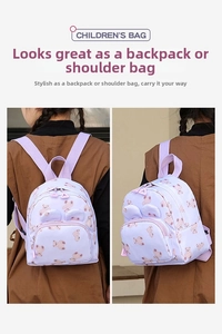Detailed view of kids cartoon bear backpack in lilac showing shoulder strap adjustments
