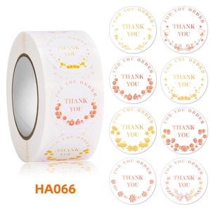 Detail view of round floral Thank You labels for gift packaging and order sealing