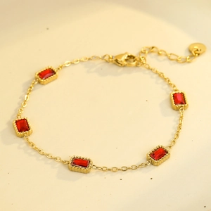 Elegant gold-plated chain bracelet featuring five rectangular red zircon stones