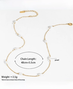 Detail of 40cm gold stainless steel chain with baroque pearls and lobster clasp