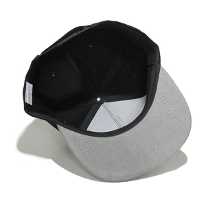 Detail showing inner sweatband and 100% acrylic wash label of the Brooklyn snapback cap