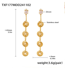 Detailed view of long stainless steel tassel earrings with gold plating and zircon