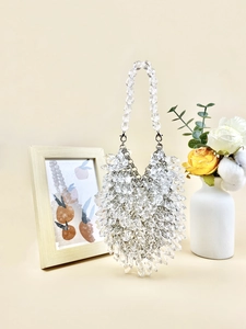 Elegant handmade transparent acrylic beaded handbag for women featuring a water droplet design