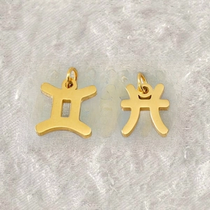 Golden stainless steel zodiac pendants featuring Gemini and Pisces hollow cutout designs