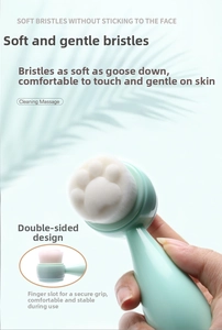 Dual-sided facial cleansing brush with soft bristles and cute cat paw ergonomic handle