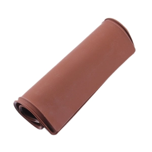 Flexible small brown silicone baking mat for Swiss rolls shown in a rolled-up state
