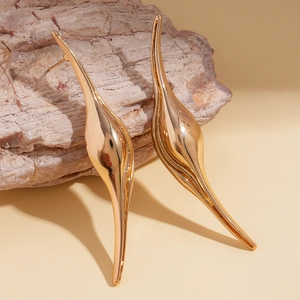 Minimalist exaggerated irregular curved leaf golden earrings with a polished metallic finish