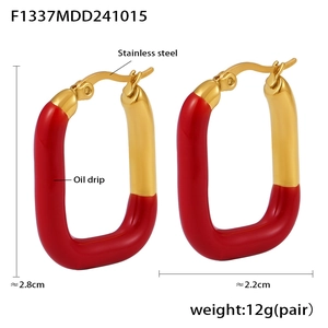 U-shaped red enamel and gold earrings with dimensions 2.8cm by 2.2cm on white background