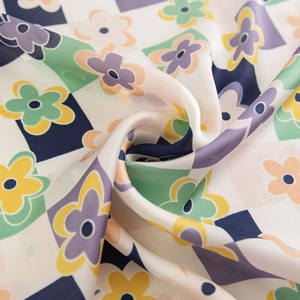 Floral geometric silk square scarf with colorful pattern and soft elegant drapes