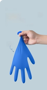 Detail showing thick blue nitrile glove with waterproof and leakproof seal texture