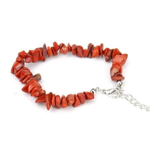 Macro detail of natural red jasper chip stone bracelet with adjustable silver lobster clasp